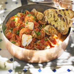 Mediterranean fish stew with garlic toasts